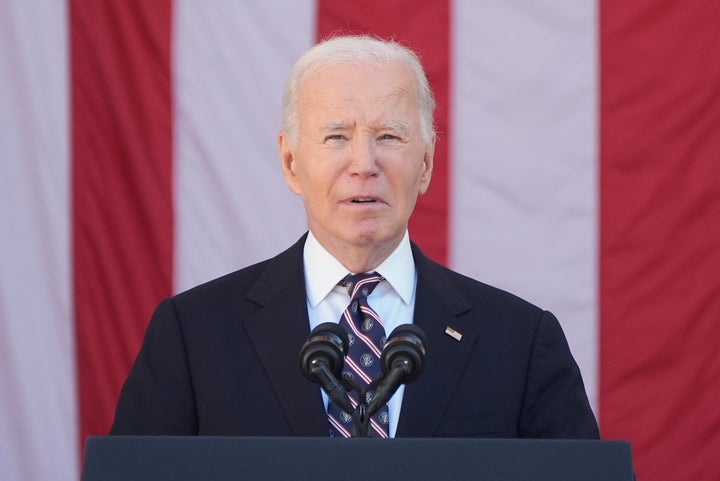 President Joe Biden speaks at the National Veterans Day Observance at the Memorial Amphitheater at Arlington National Cemetery in Arlington, Va., Monday, Nov. 11, 2024. (AP Photo/Mark Schiefelbein)
