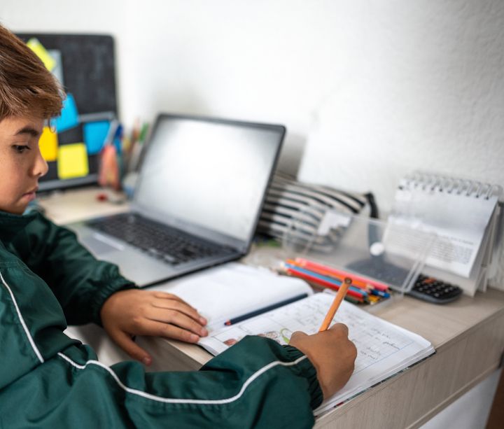 Child doing homework at home