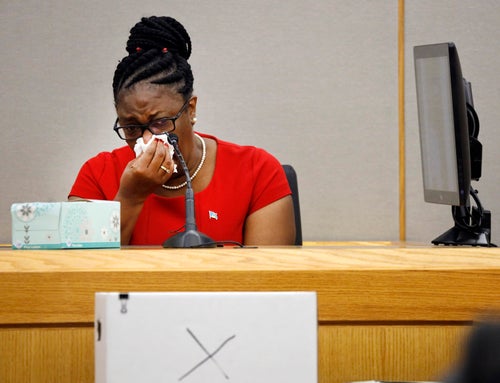 Botham Jean's mother, Allison Jean, cries on Oct. 1, 2019, while speaking about her son during sentencing testimony for former Dallas police Officer Amber Guyger. Guyger, who said she fatally shot her neighbor after mistaking his apartment for her own, was convicted of murder.