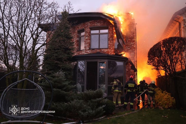 Firefighters work at the site of a Russian missile strike in Dnipro, Ukraine November 21, 2024.
