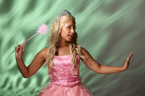 A cosplayer dressed as Glinda poses for a photo during 2024 New York Comic Con at Jacob Javitz Center on Oct. 19 in New York City.