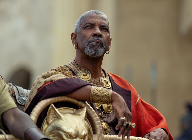 Denzel Washington portrays Macrinus in Gladiator II.