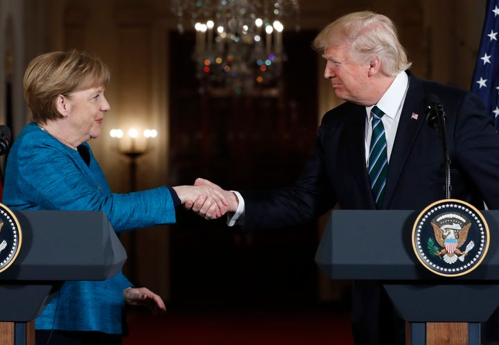 President Donald Trump and German Chancellor Angela Merkel shake hands following their joint news conference in the East Room of the White House in Washington, Friday, March 17, 2017. (AP Photo/Pablo Martinez Monsivais, File)