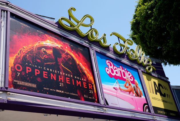 The marquee for the Los Feliz Theatre features the films 