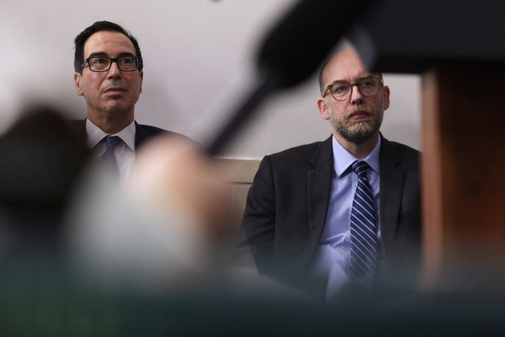 WASHINGTON, DC - AUGUST 10: U.S. Treasury Secretary Steven Mnuchin and White House Budget Director Russell Vought look on during a news conference at the James Brady Press Briefing Room of the White House August 10, 2020 in Washington, DC. (Photo by Alex Wong/Getty Images)