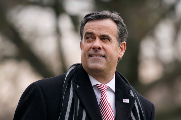 FILE - Director of National Intelligence John Ratcliffe waits to board Marine One with President Donald Trump on the South Lawn of the White House in Washington, Dec. 12, 2020. (AP Photo/Patrick Semansky, File)