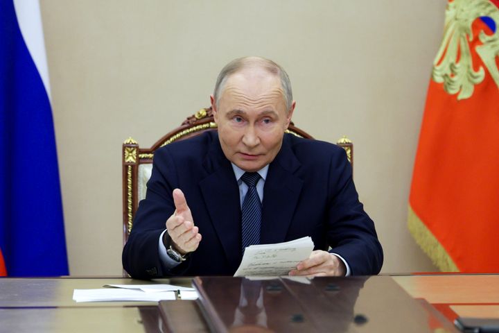 Vladimir Putin gestures as he speaks during a meeting with the leadership of the Russian Ministry of Defence at the Kremlin last week.