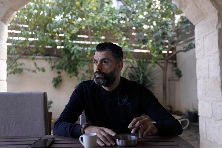 Ahmed Khalefa, a Palestinian citizen of Israel whom police charged with "incitement to terrorism" for protesting the ongoing war in Gaza, is seen at home in Umm al-Fahm, Israel, on Wednesday, Nov. 20, 2024.