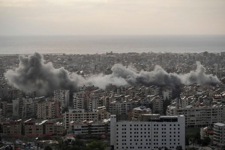 Smoke rise from Israeli airstrikes in Dahiyeh, Beirut, Sunday, Nov. 24, 2024. (AP Photo/Hassan Ammar)