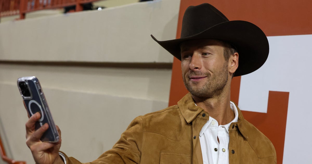 NextImg:Glen Powell Offers Winner Of His Look-Alike Contest A 'Personal Prize'