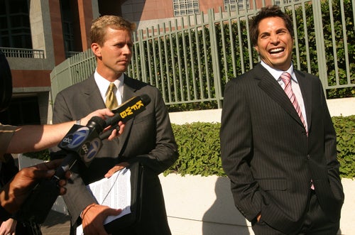Girls Gone Wild founder Joe Francis talks to the media with his attorney Aaron Dyer outside the Edward R. Roybal Federal Building in Downtown Los Angeles on Sept. 25, 2006, after pleading guilty to two felonies of violating federal record-keeping and labeling laws meant to protect minors from sexual exploitation.