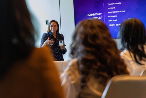 Maria Weaver, former global president of Warner Music Experience, talks to women at the summit about leading as executives.