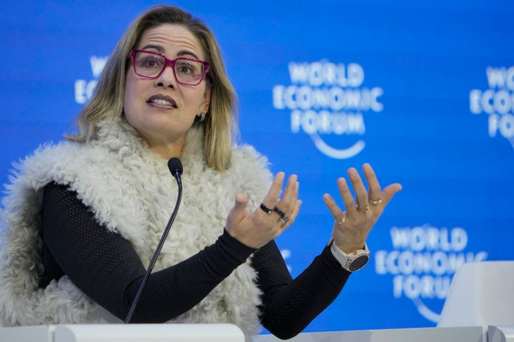 Sen. Kyrsten Sinema (I-Ariz.) speaks on a panel at the World Economic Forum in Davos, Switzerland in Jan. 2023. Gallego painted her as beholden to corporations and big donors.