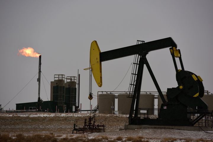 A pump jack extracts oil at a well in North Dakota.