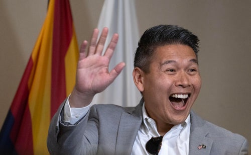 Buena Park, CA - October 26: Derek Tran waves to supporters in Buena Park on Saturday, October 26, 2024 as he runs in the 45th congressional district. Former President Bill Clinton made an appearance at Tran's and also Dave Min's events in hopes of shifting control of the House. Min is running in the 47th congressional district.(Photo by Mindy Schauer/MediaNewsGroup/Orange County Register via Getty Images)