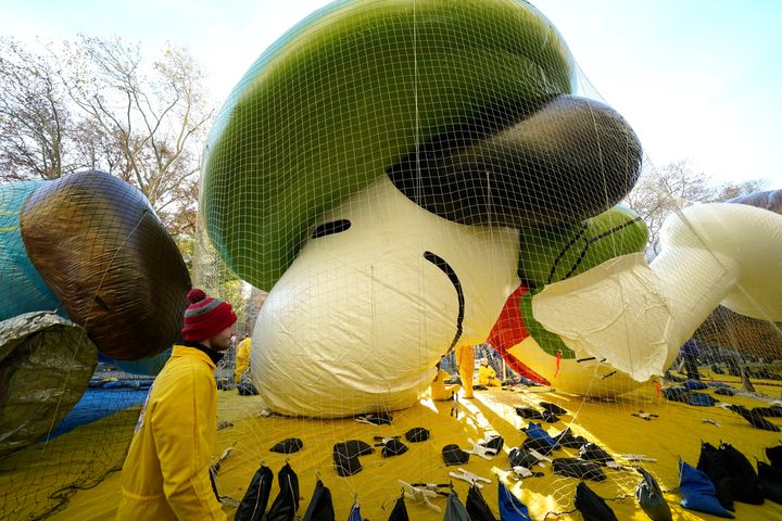 The Beagle Scout Snoopy balloon is prepared during the 2024 Macy's Thanksgiving Day Parade Balloon Inflation on the Eve of the parade in New York, November 27, 2024. The annual Macy's Thanksgiving Day Parade in New York City started in 1924. (Photo by TIMOTHY A. CLARY / AFP) (Photo by TIMOTHY A. CLARY/AFP via Getty Images)