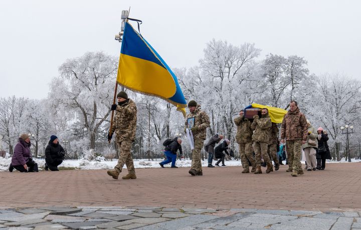 Fellow soldiers carry a coffin of leading actor of the music and drama theatre Petro Velykiy, 48, who was killed in a battle with the Russian troops in Russia's Kursk region, during a farewell ceremony in Chernyhiv, Ukraine, on Nov. 27, 2024.