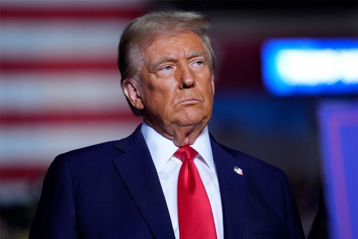 Republican presidential nominee former President Donald Trump listens during a campaign rally at Santander Arena, Monday, Nov. 4, 2024, in Reading, Pa. (AP Photo/Evan Vucci)