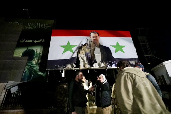 ALEPPO, SYRIA - NOVEMBER 29: Anti-regime armed groups clashing with Bashar al-Assad regime forces in Syria start to enter Aleppo city center in Syria on November 29, 2024. (Photo by Izettin Kasim/Anadolu via Getty Images)