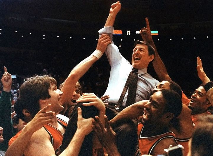 FILE - St. John's coach Lou Carnesecca is carried by his team after the Redman beat Boston College in the Big East Championship at New York's Madison Square Garden, on March 12, 1983. (AP Photo/G. Paul Burnett, File)