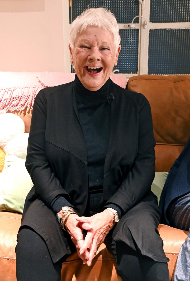 Dame Judi Dench poses for a photo at London's Prince of Wales Theatre on Nov. 17. The revered actor talked about her foul-mouthed pet parrot in a new interview.