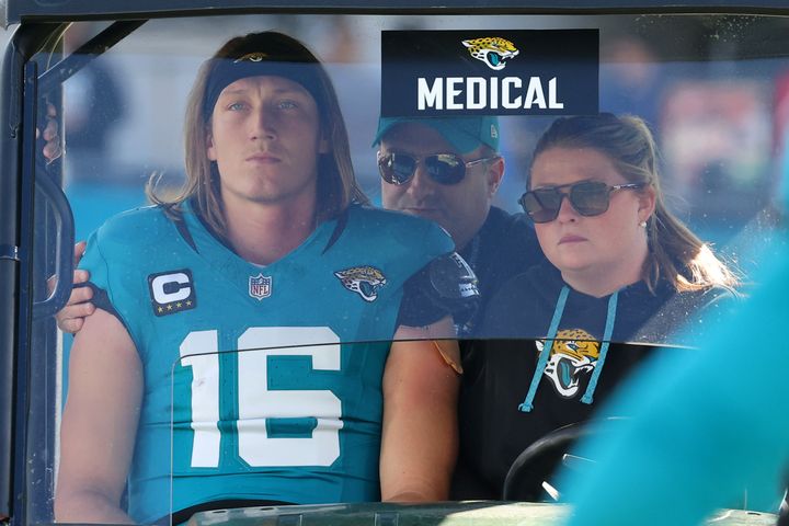 Quarterback Trevor Lawrence is taken off the field in a medical cart during the second quarter of a game against the Houston Texans. (Photo by Mike Carlson/Getty Images)