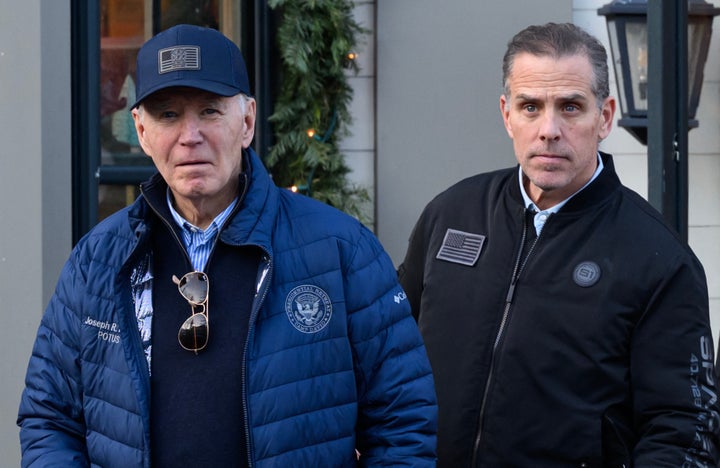 President Joe Biden is seen with his son, Hunter Biden, in Nantucket, Massachusetts, on Nov. 29. Biden on Sunday issued an official pardon for Hunter, who is facing sentencing for two criminal cases related to tax evasion and the purchase of a firearm.