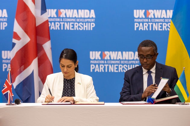 Then home secretary Priti Patel and Rwanda's minister of foreign affairs Vincent Biruta,sign their 