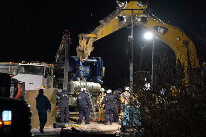 Rescue workers search through the night in a sinkhole for Elizabeth Pollard, who disappeared while looking for her cat, in Marguerite, Pa., on Dec. 3, 2024.