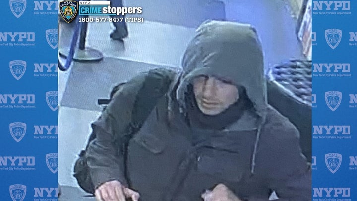 A second image released Thursday by police shows the same "person of interest" sought for questioning in Thompson's death.
