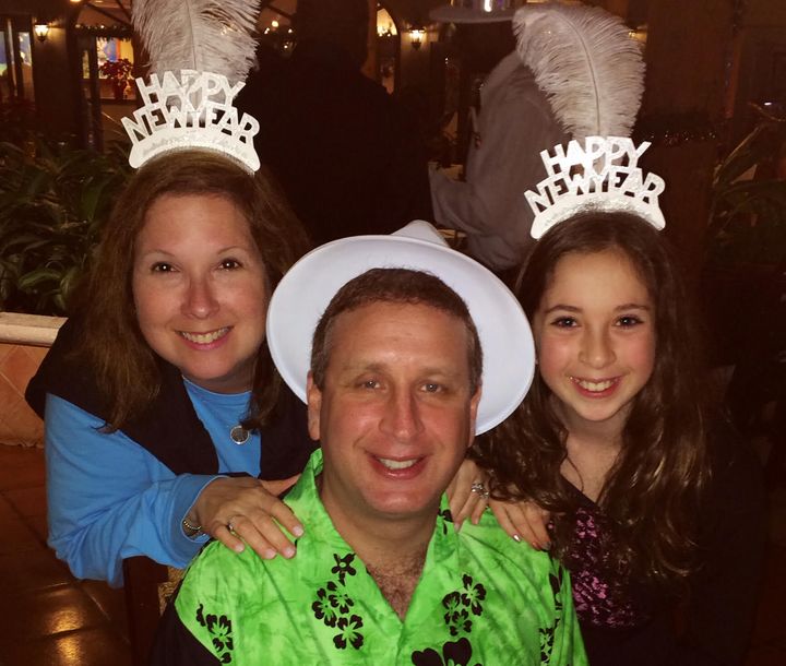 The author and her daughter and husband celebrating New Year's Eve in a previous year.