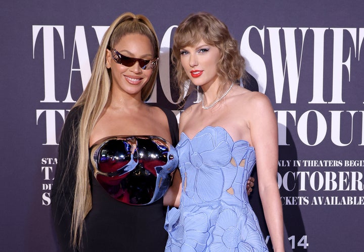 Beyoncé Knowles-Carter and Taylor Swift attend the "Taylor Swift: The Eras Tour" Concert Movie World Premiere at AMC The Grove 14 on Oct. 11, 2023, in Los Angeles.