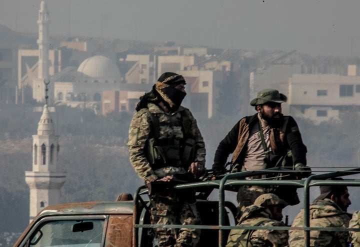 HOMS, SYRIA - DECEMBER 6: Anti-regime armed groups, opposing the Bashar al-Assad regime, advance inner parts of Homs, Syria on December 6, 2024. (Photo by Izettin Kasim/Anadolu via Getty Images)