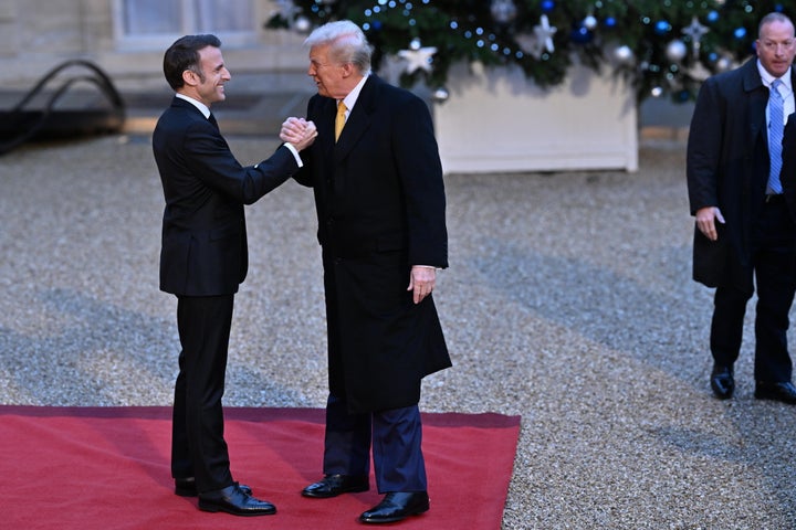  France's President Emmanuel Macron welcomes US president-elect Donald Trump before a meeting at The Elysee Presidential Palace in Paris, France on December 7, 2024.