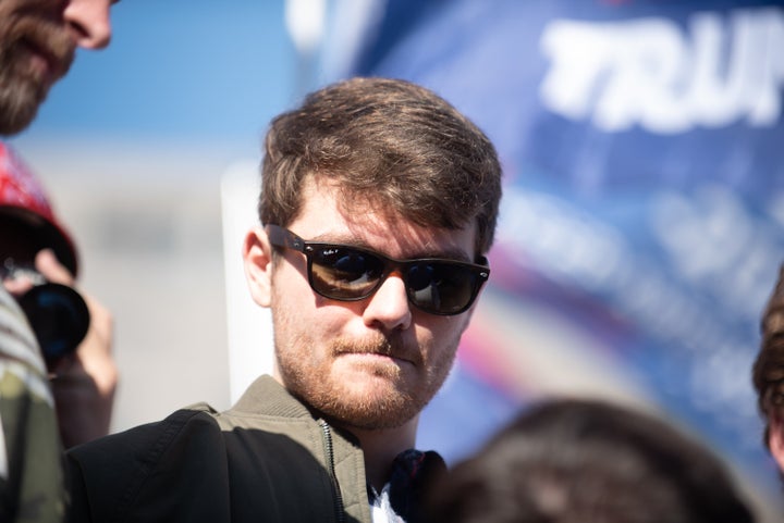 Fuentes, seen here speaking to a white nationalist group in 2020, is due in court Dec. 19.