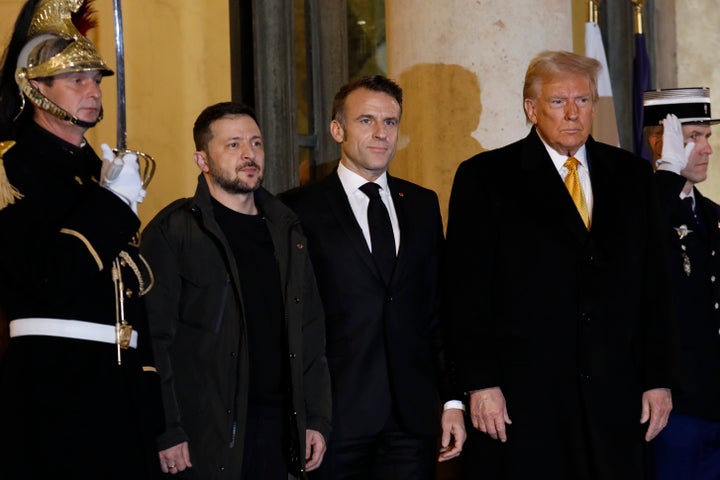 Ukrainian President Volodymyr Zelensky, French President Emmanuel Macron, and U.S. President-elect Donald Trump pose for photographers after their meeting at the Elysee Presidential Palace on December 7, 2024 in Paris, France. (Photo by Antoine Gyori - Corbis/Corbis via Getty Images)