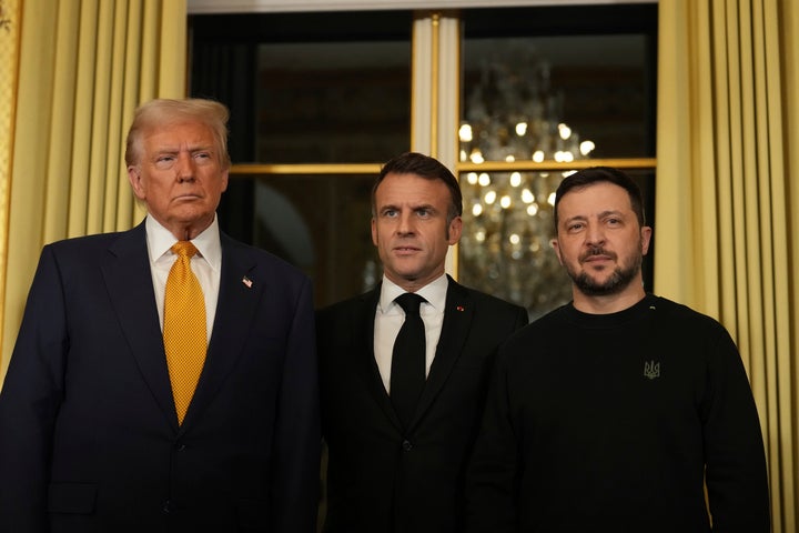 French President Emmanuel Macron, centre, poses with President-elect Donald Trump, left, and Ukraine's President Volodymyr Zelenskyy at the Elysee Palace, Saturday, Dec. 7, 2024 in Paris. 