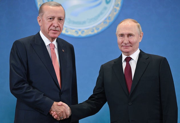 Russian President Vladimir Putin, right, and Turkey's President Recep Tayyip Erdogan 