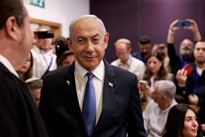 Israeli Prime Minister Benjamin Netanyahu arrives at the district court in Tel Aviv for his hearing on corruption charges on Dec. 10, 2024. 