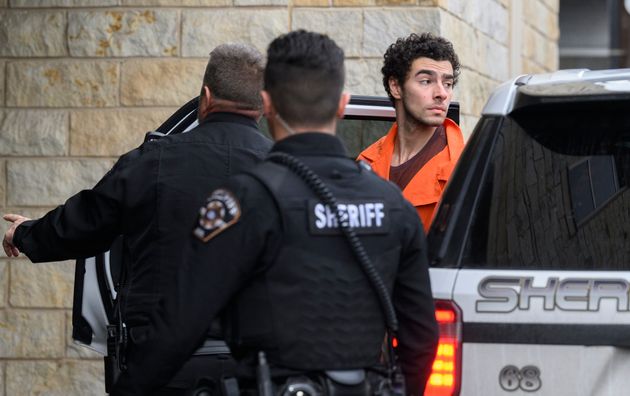 Suspected shooter Luigi Mangione is led into the Blair County Courthouse for an extradition hearing December 10, 2024 in Hollidaysburg, Pennsylvania. 