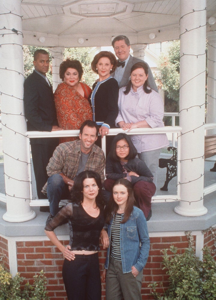 The cast of "Gilmore Girls" poses for a photo in Stars Hollow’s gazebo in 2000.