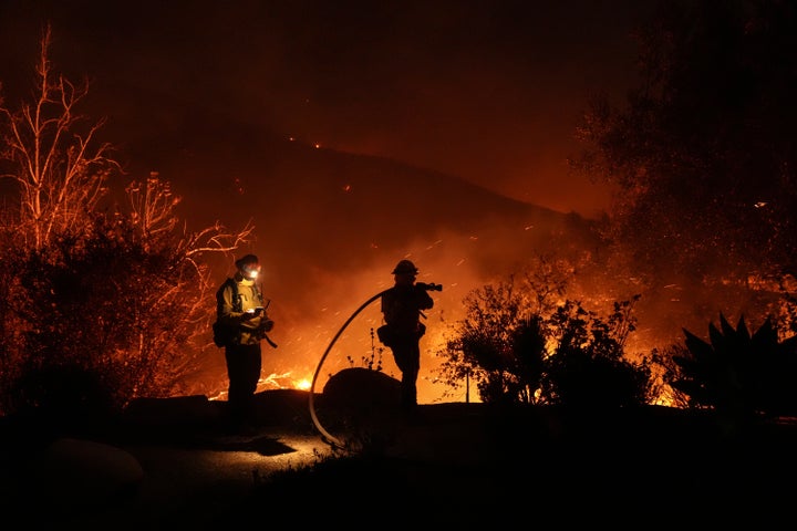 Firefighters battle the Franklin Fire in Malibu, Calif., on Dec. 10, 2024.
