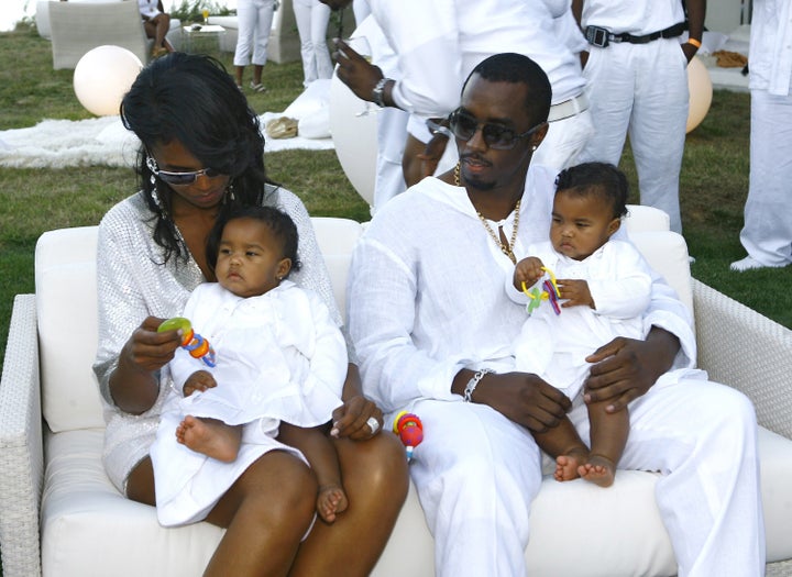 Combs and his late ex-partner Kim Porter and their twin daughters at his 2007 White Party.