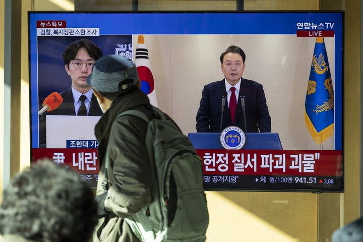 A television screen displays a news report featuring South Korean President Yoon Suk Yeol at Seoul Station in Seoul, South Korea, on Thursday, Dec. 12, 2024. Yoon said he would fight until the last minute to defend himself after accusing the opposition of trying to paralyze his administration. Yoon's defiant Thursday morning speech came as the chief of his own party called for his impeachment. Photographer: Jean Chung/Bloomberg via Getty Images