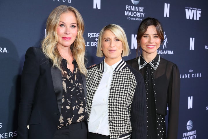 Liz Feldman, center, with "Dead to Me" actors Christina Applegate and Linda Cardellini in 2019. Applegate recently shared how her earliest experiences with multiple sclerosis occurred while filming the series.