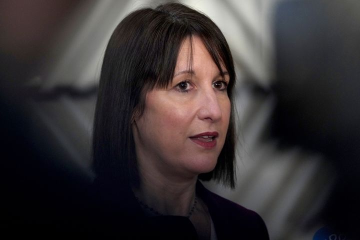 Britain's Chancellor of the Exchequer Rachel Reeves speaks with the media as she arrives for a meeting of eurogroup finance ministers at the European Council building in Brussels.