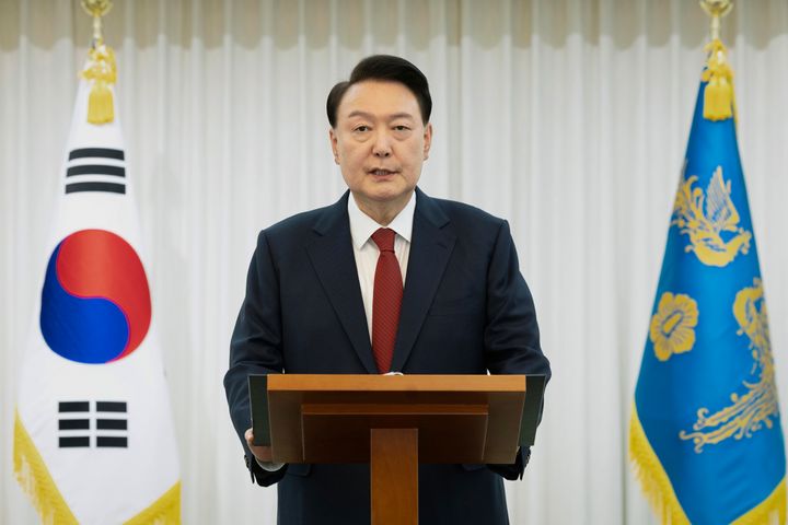 In this photo released by South Korean President Office via Yonhap, South Korean President Yoon Suk Yeol speaks at the presidential residence in Seoul, South Korea, Saturday, Dec. 14, 2024. (South Korean Presidential Office/Yonhap via AP)