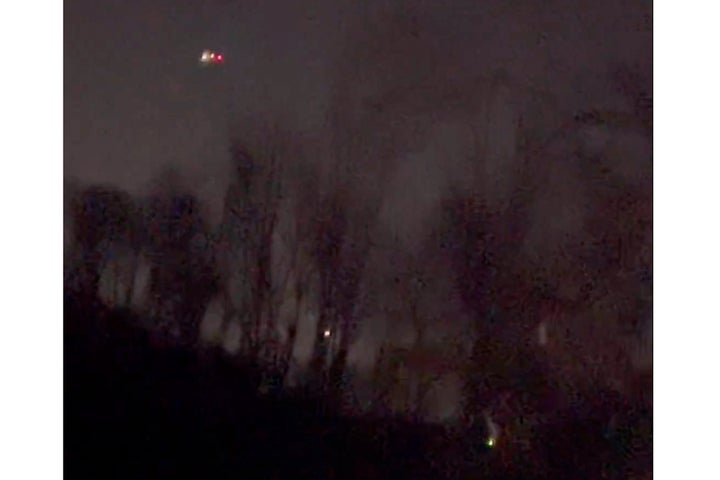 In this image taken from video provided by MartyA45_, several drones appear to be flying over Randolph, N.J., on Wednesday, Dec. 4, 2024.