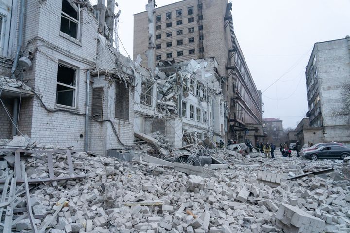 A view of destruction as the emergency services work to rescue civilians trapped under the rubble of a destroyed building after Russian attack on Zaporizhzhia, Ukraine on December 10.