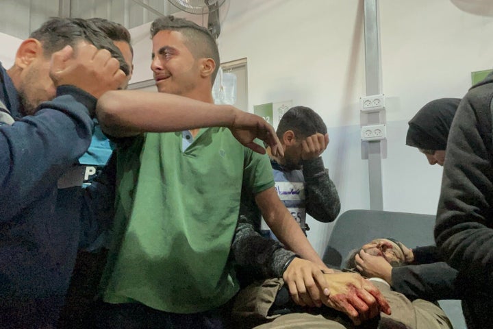 Khaled Nabhan (on bed), who honored his 3-year-old grandchild, Reem, in what became a viral video after she was killed by an Israeli airstrike, was himself killed during an Israeli attack at the Nuseirat refugee camp in Gaza on Monday. Here, Nabhan's body is taken from the morgue of Al-Awda Hospital for funeral prayers and burial.